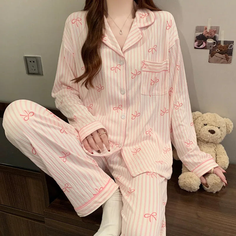 Pink bow kawaii pajama set with long sleeve top and matching ankle-length pants